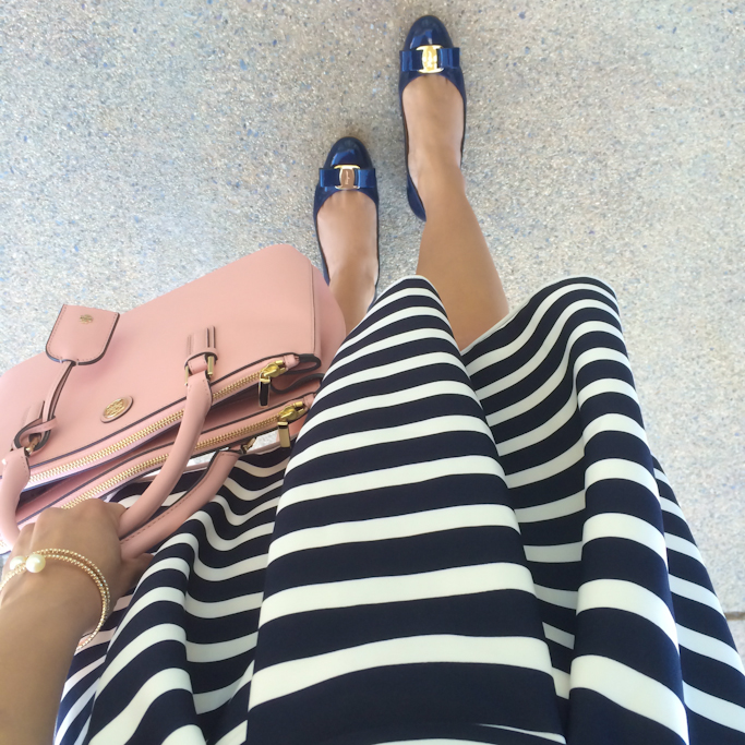 blush purse striped pleated skirt pearl bracelet Ferragamo flats