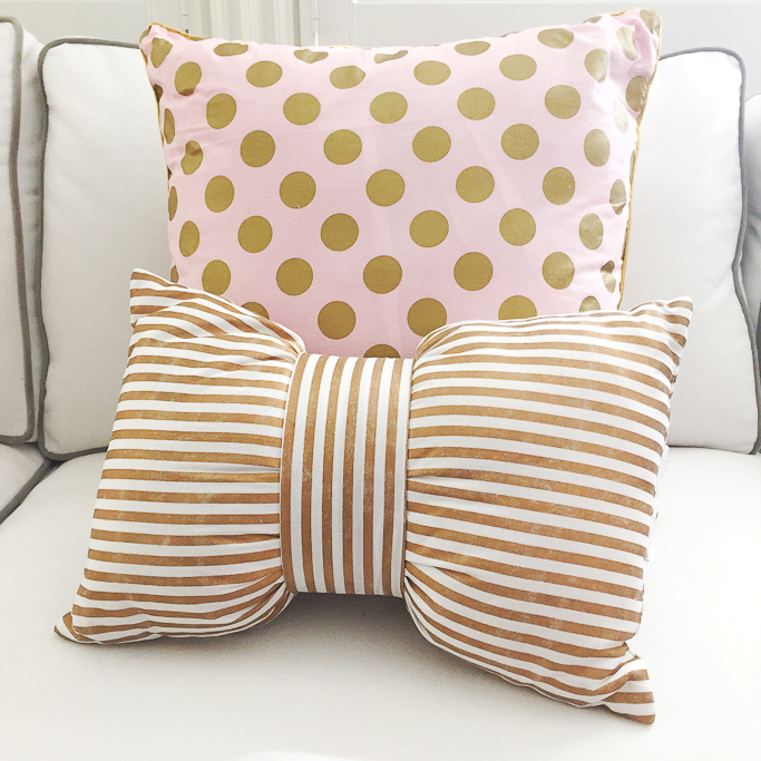 Target xhiliration gold bow striped pillow