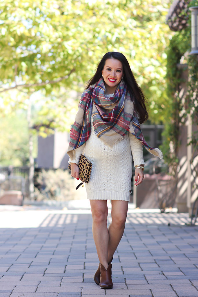 6 ways to wear a plaid blanket scarf, Clare V leopard foldover clutch, Fall outfit, Loft cognac bow belt, Mac ruby woo red lipstick, Nordstrom cable knit sweater drses, Petite maternity outfits p, plaid blanket scarf, Vince Camuto franell western ankle booties