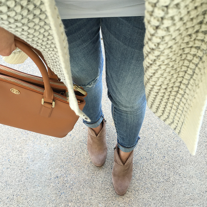 casual Fall outfit, Nordstrom Junior Women's Rip Curl Shambala Open Front Cardigan, STS blue cropped boyfriend jeans, Tory Burch mini Robinson bag in luggage, Vince Camuto franell western ankle booties