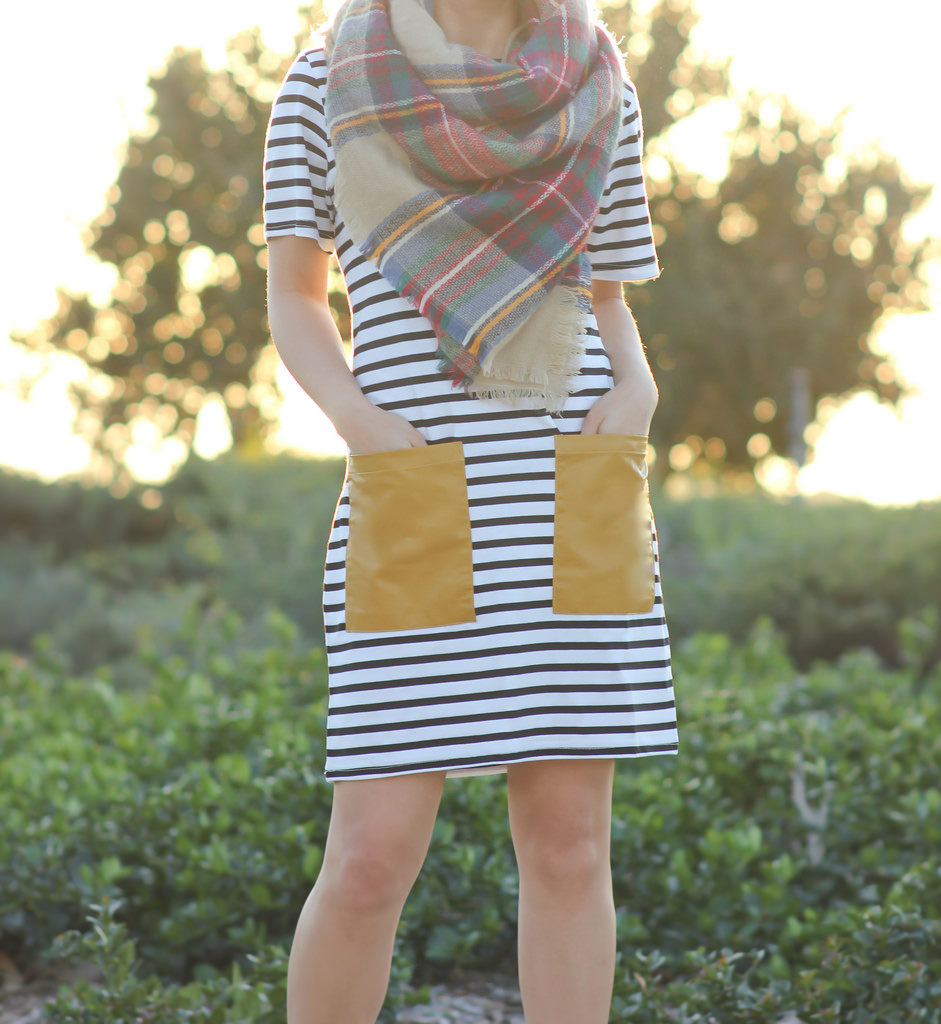 Striped dress with faux leather pockets, plaid blanket scarf