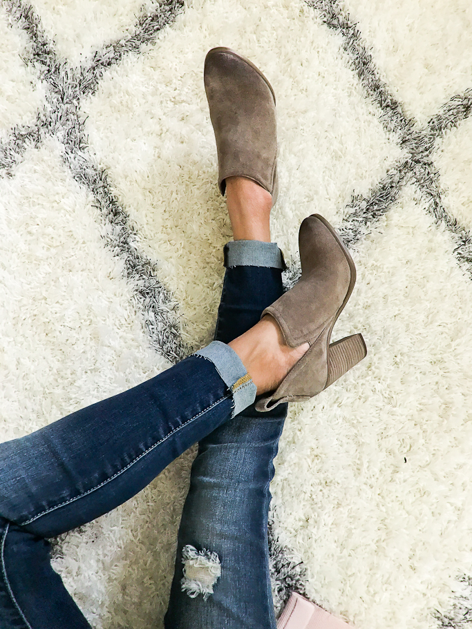 fall ankle booties with distressed raw hem jeans