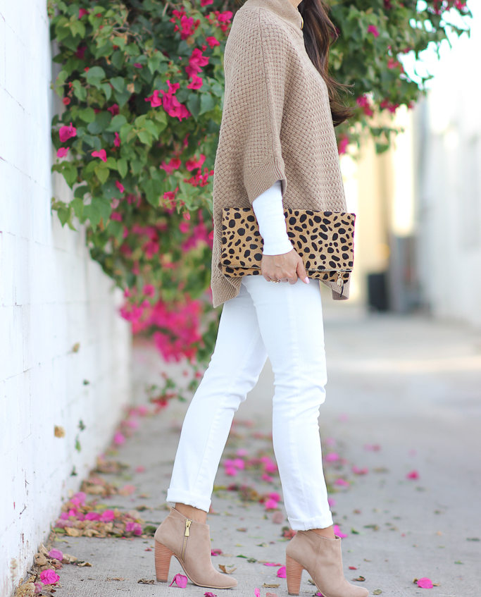 fall outfit camel cape leopard clutch white jeans sweater poncho