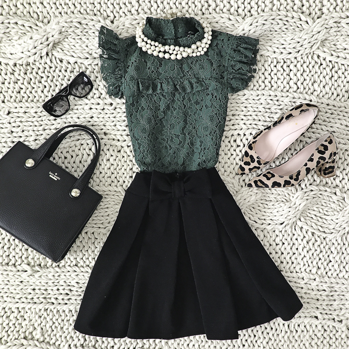 green lace mock neck top bow skirt leopard pumps faux pearl necklace