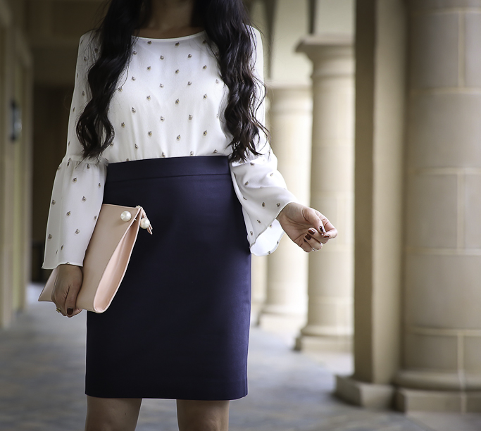 bell sleeve top navy pencil skirt fall work outfit blush clutch