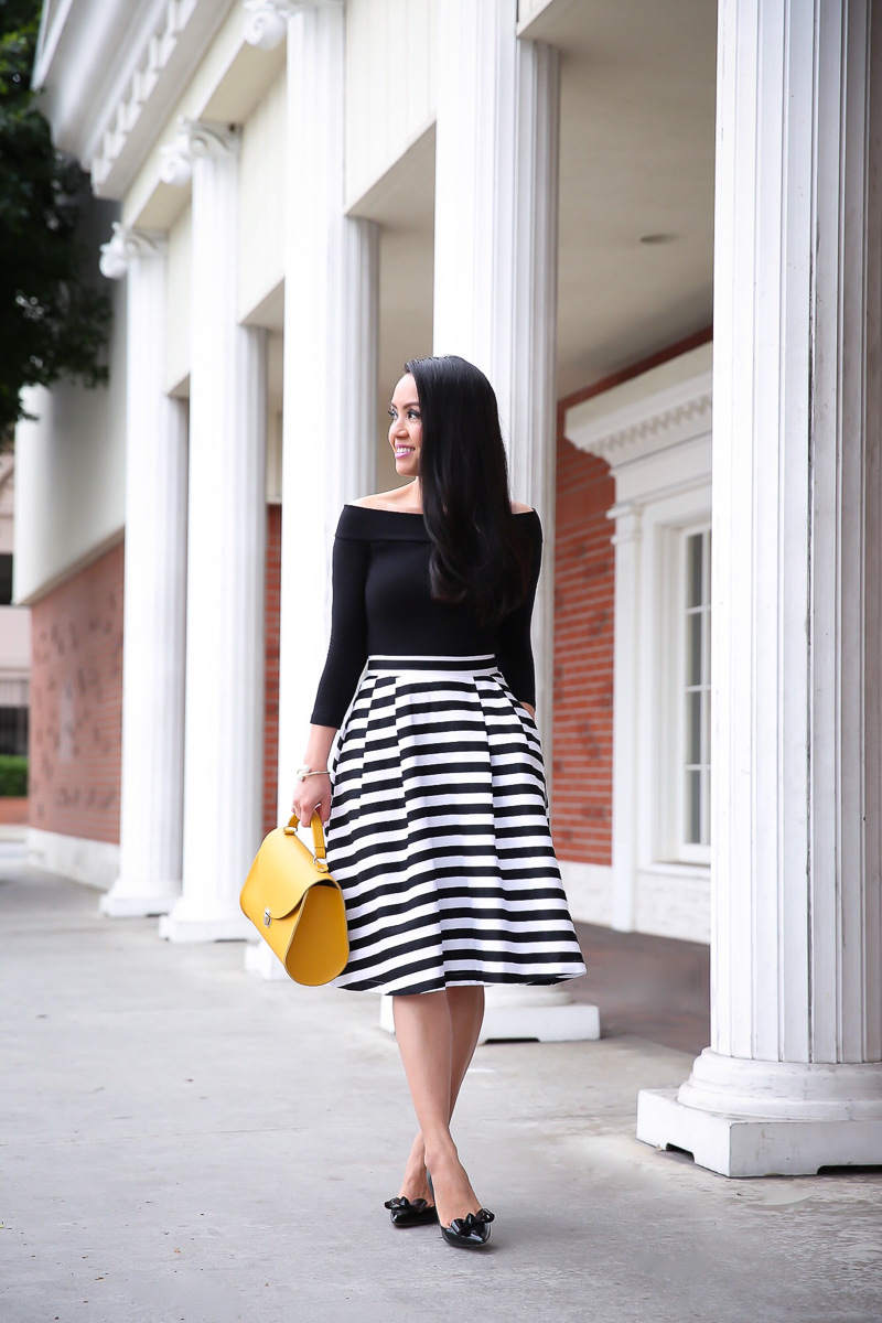 striped midi skirt black off the shoulder top mustard bag bow pumps