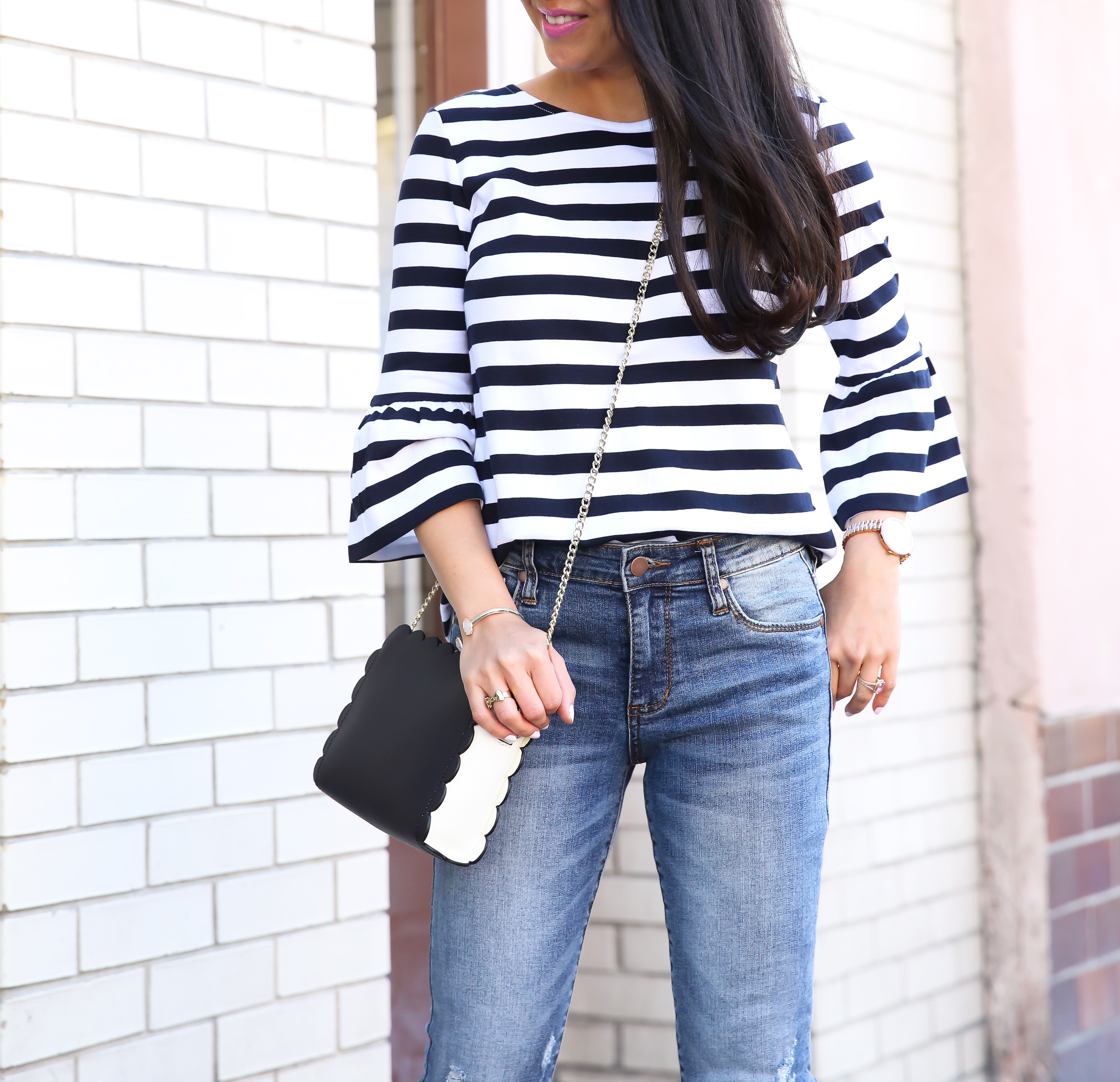 striped flare sleeve top scalloped crossbody step hem jeans casual outfit
