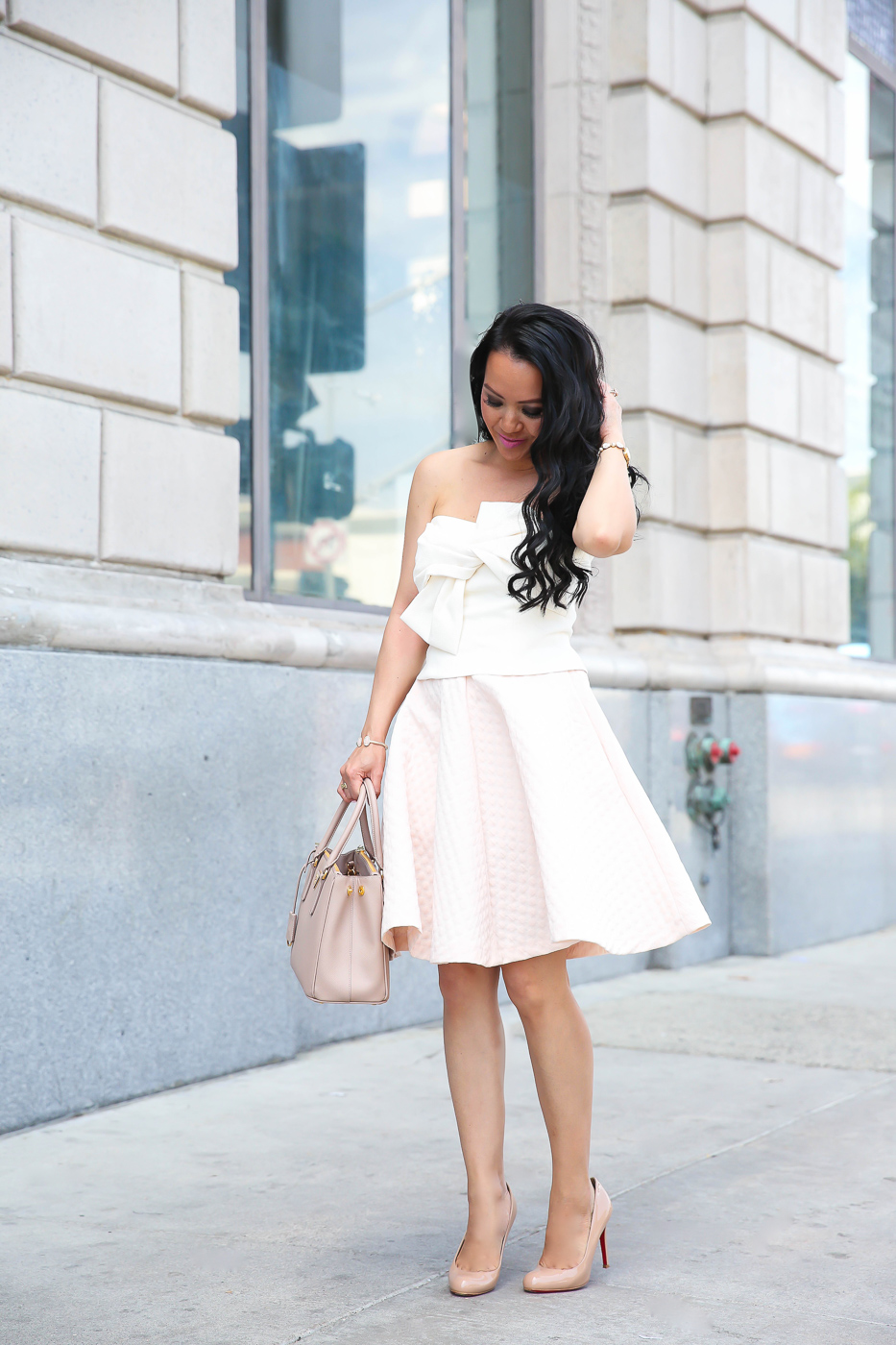 bow top spring wedding outfit idea blush pink circle skirt