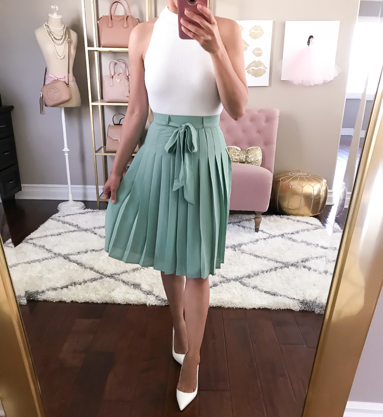 mint pleated skirt white pumps white sweater halter top