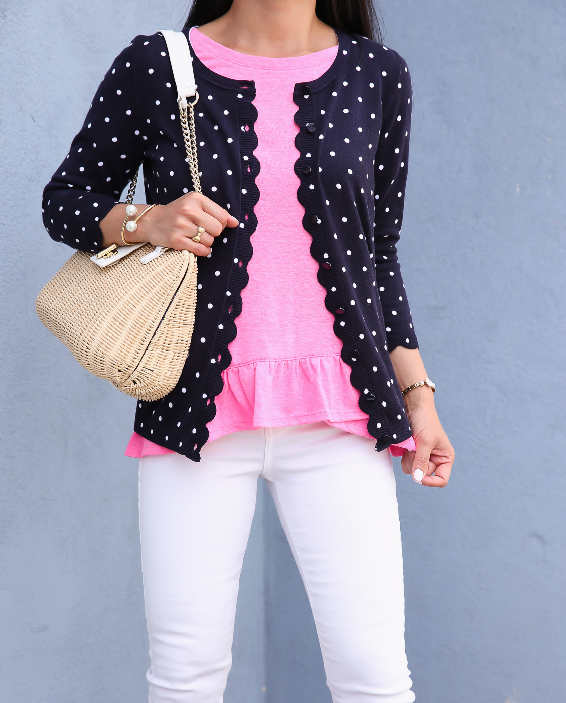 wicker shoulder bag ruffle hem tee scalloped polka dot cardigan white jeans business casual summer outfit