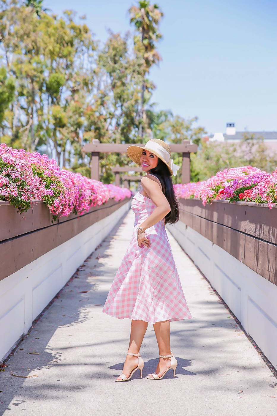 bow hat pink gingham midi dress summer outfit idea