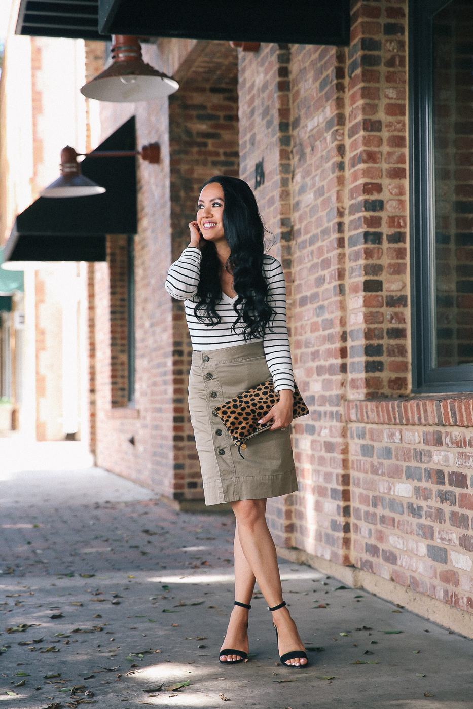 olive skirt striped sweater leopard clutch