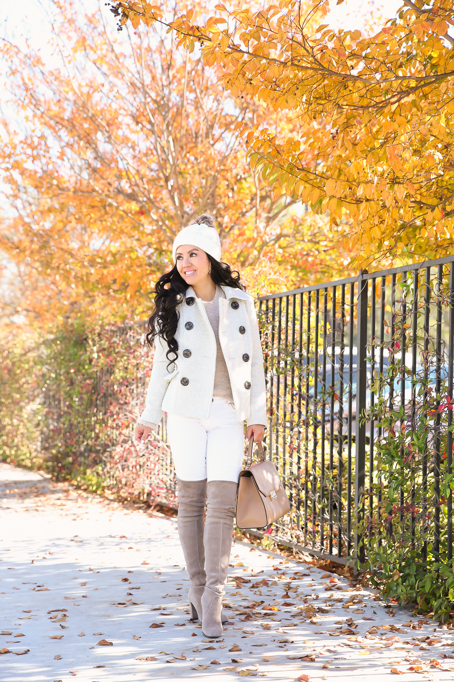 gray peacoat white jeans highland over the knee boots boucle sweater winter outfit pom beanie