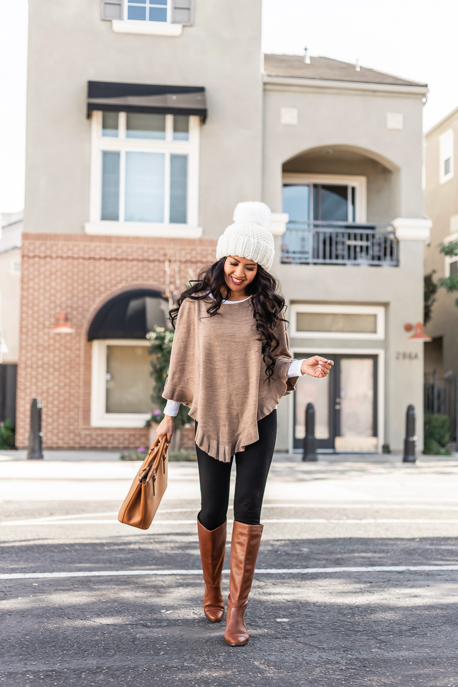 petite ruffled poncho cognac boots casual winter outfit pom pom beanie