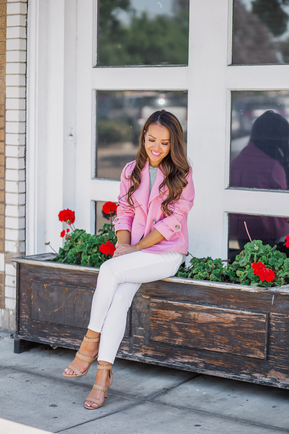 pink short trench coat white jeans spring outfit camel scalloped sandals