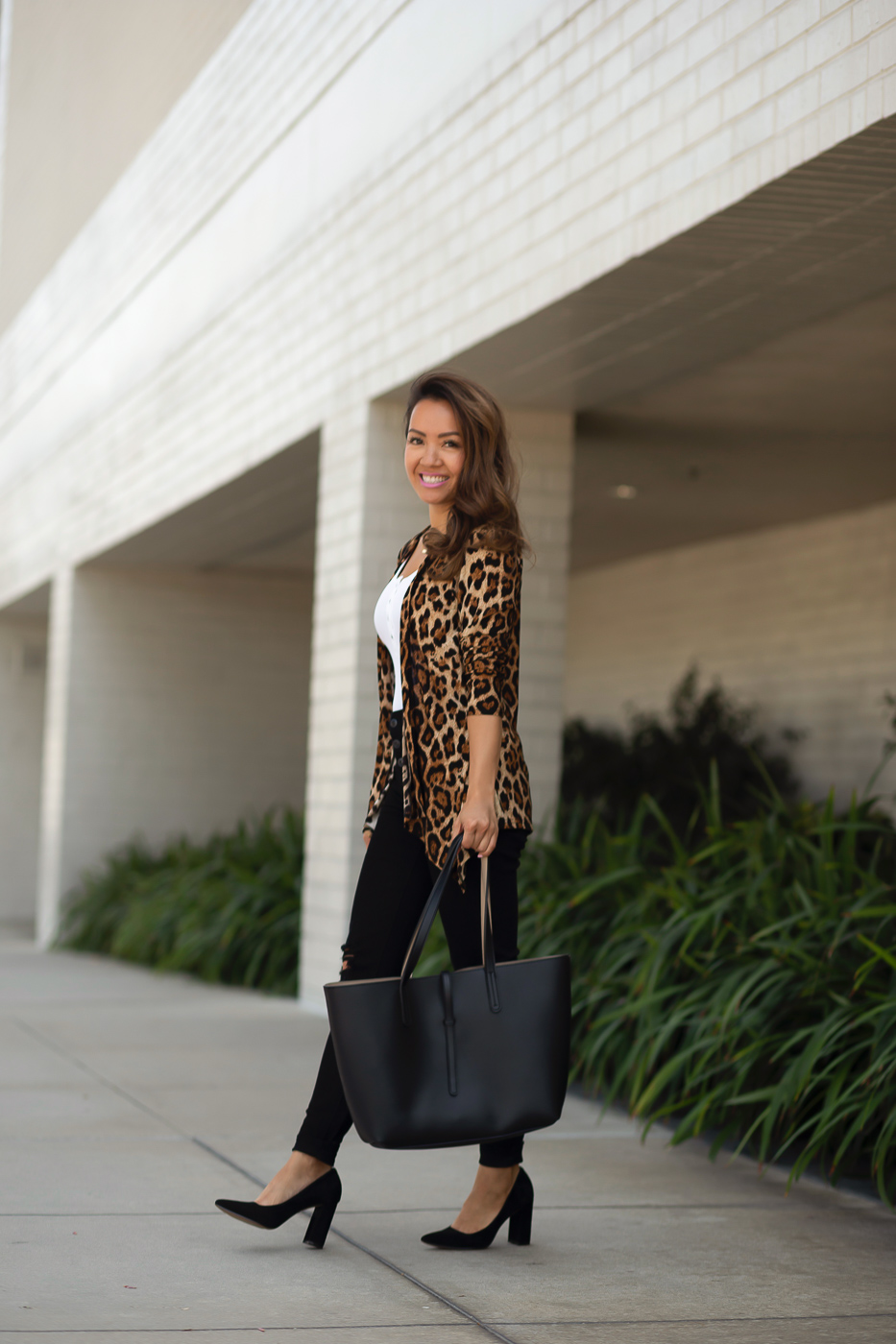 Leopard Tee, Olive Cardigan, Black Jeans, Black Slip-on Sneakers, and  Cognac Tote Outfit Side View 1 - Putting Me Together