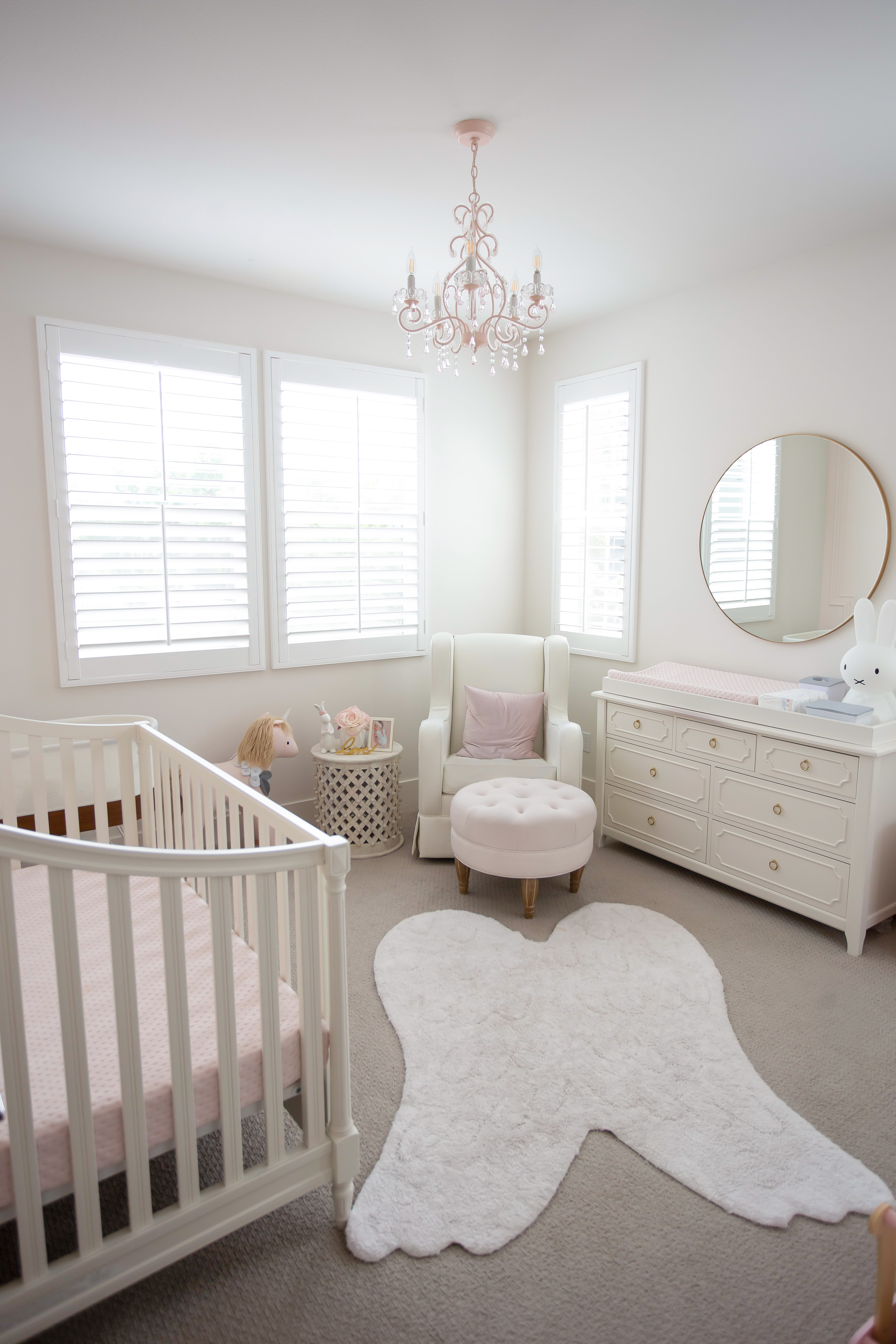 lorena canal angel wings rug pink chandelier baby girls gold white pink nursery decor round mirror