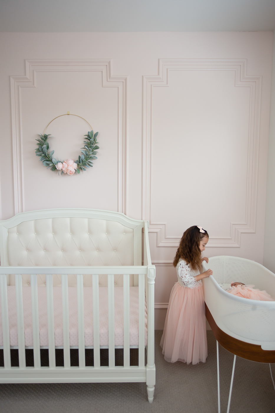 baby girl nursery sherwin williams intimate white snoo bassinet pottery barn kids tufted crib